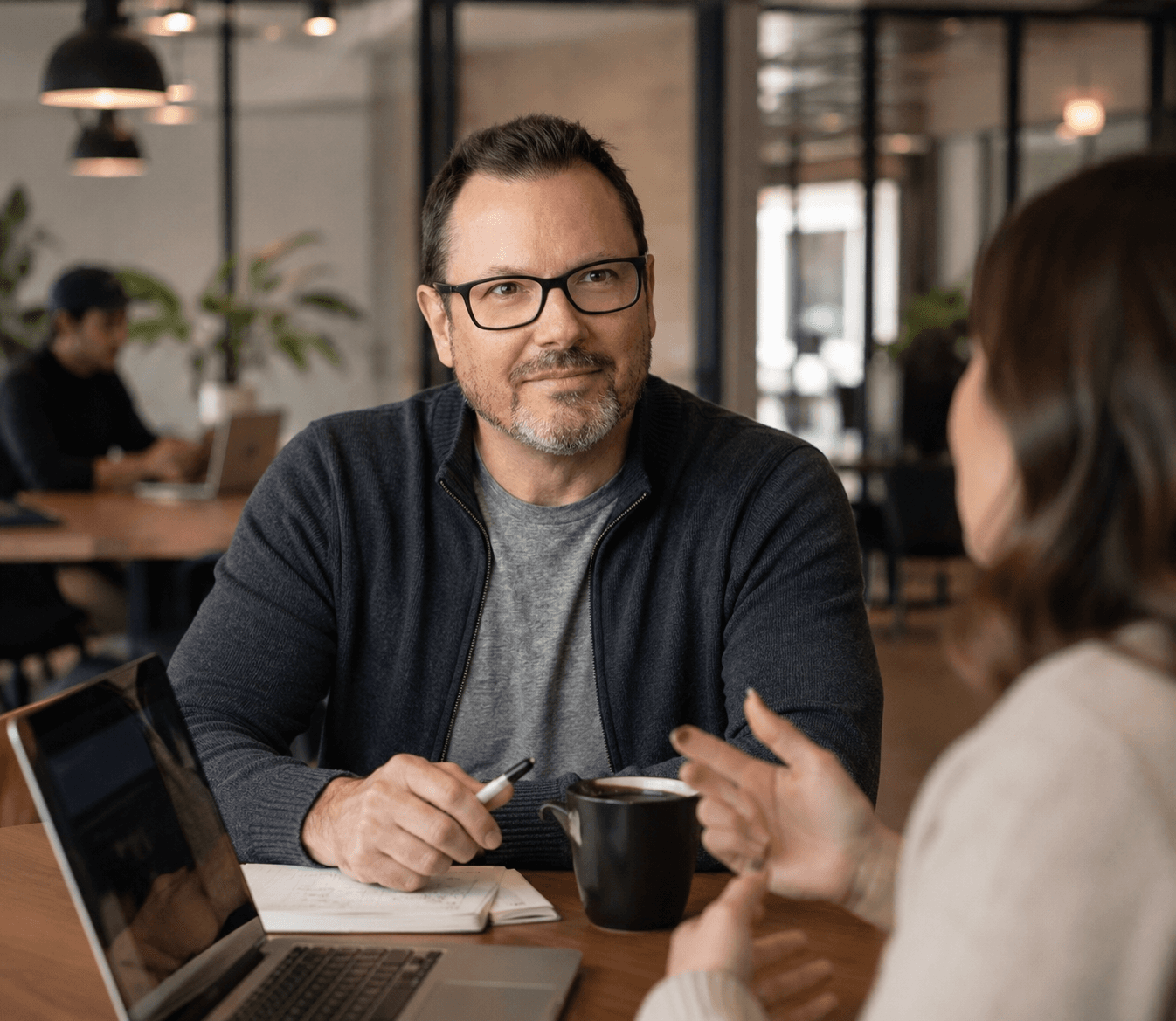 Andy Wilson working through a plan with a client