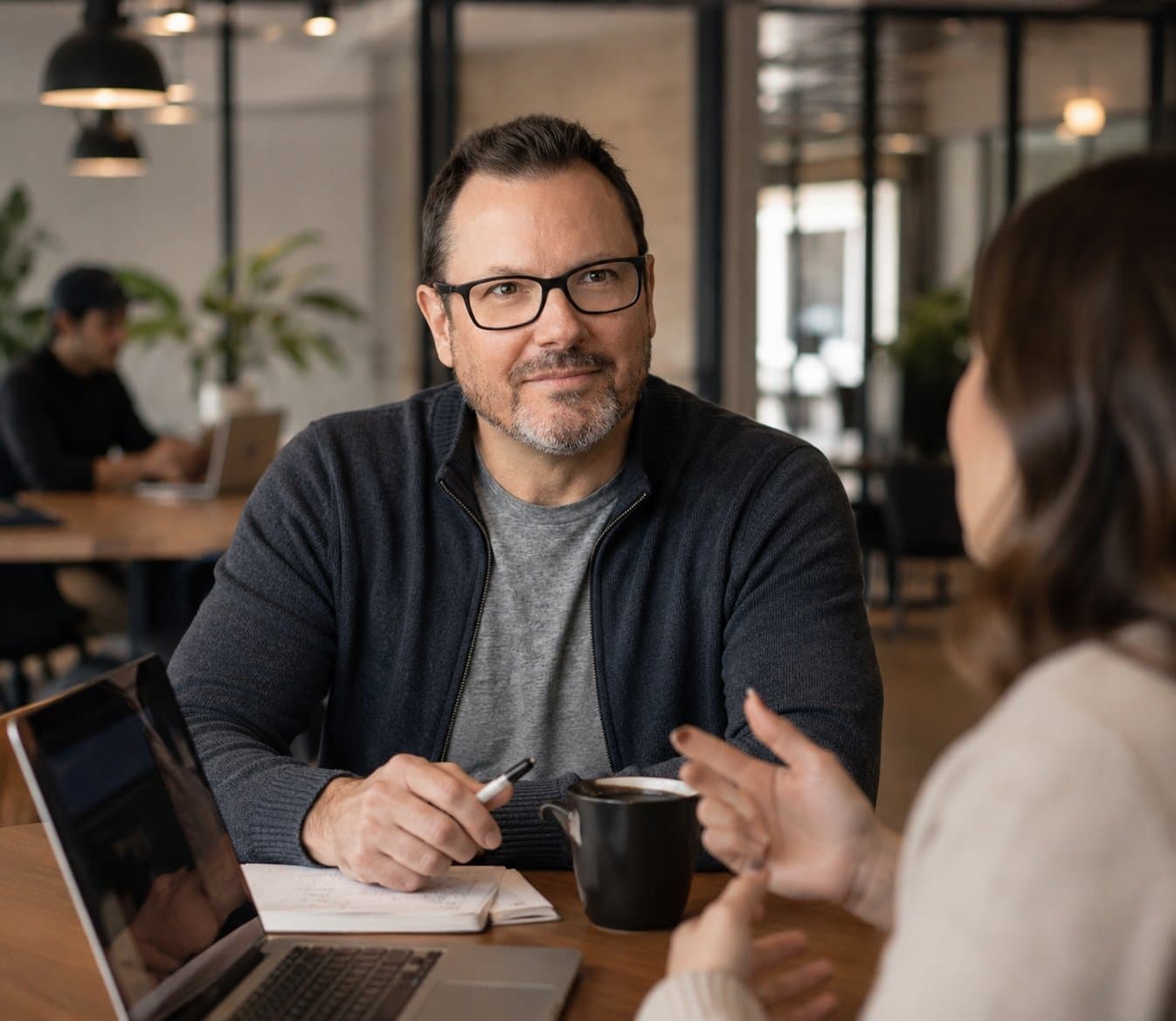 Andy Wilson working through a plan with a client
